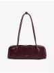 alaia-teckel-small-leather-top-handle-bag-main-1.jpg