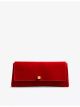 khaite-audrey-suede-clutch-bag-main-1.jpg