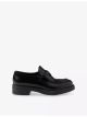 prada-logo-plaque-leather-loafers-main-1.jpg