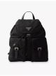 prada-logo-plaque-polyamide-backpack-main-1.jpg
