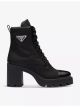 prada-re-nylon-logo-plaque-leather-and-recycled-nylon-heeled-boots-main-1.jpg