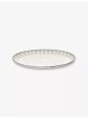 serax-inku-oval-stoneware-plate-25cm-main-1.jpg