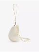 simone-rocha-micro-egg-pearlescent-crossbody-acrylic-bag-main-1.jpg
