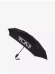 tumi-compact-travel-umbrella-main-1.jpg