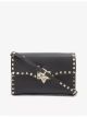 valentino-garavani-rockstud-leather-crossbody-satchel-main-1.jpg