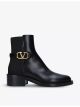 valentino-garavani-vlogo-leather-chelsea-boots-main-1.jpg